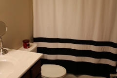 A bathroom with a toilet and sink in it